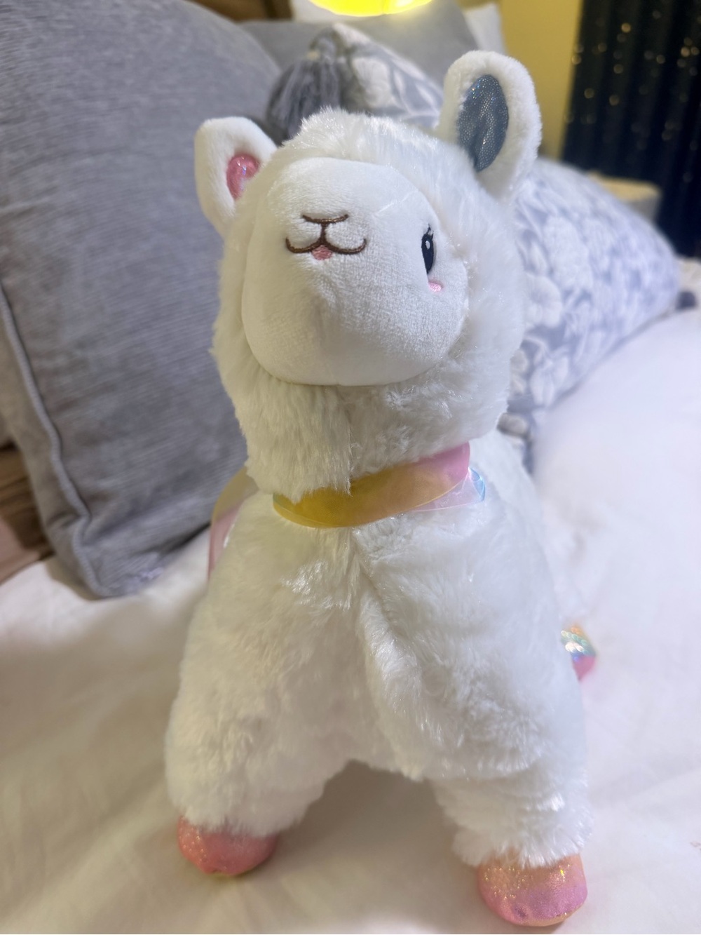FAO Schwarz Light Up White Plush Alpaca with Pastel Rainbow Ribbon